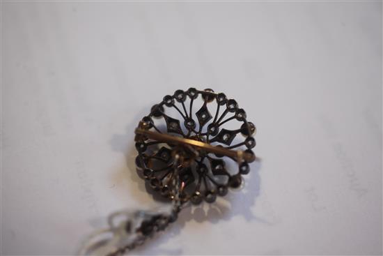 An early 20th century gold and silver, diamond and cultured pearl set openwork circular pendant brooch, 1.25in.